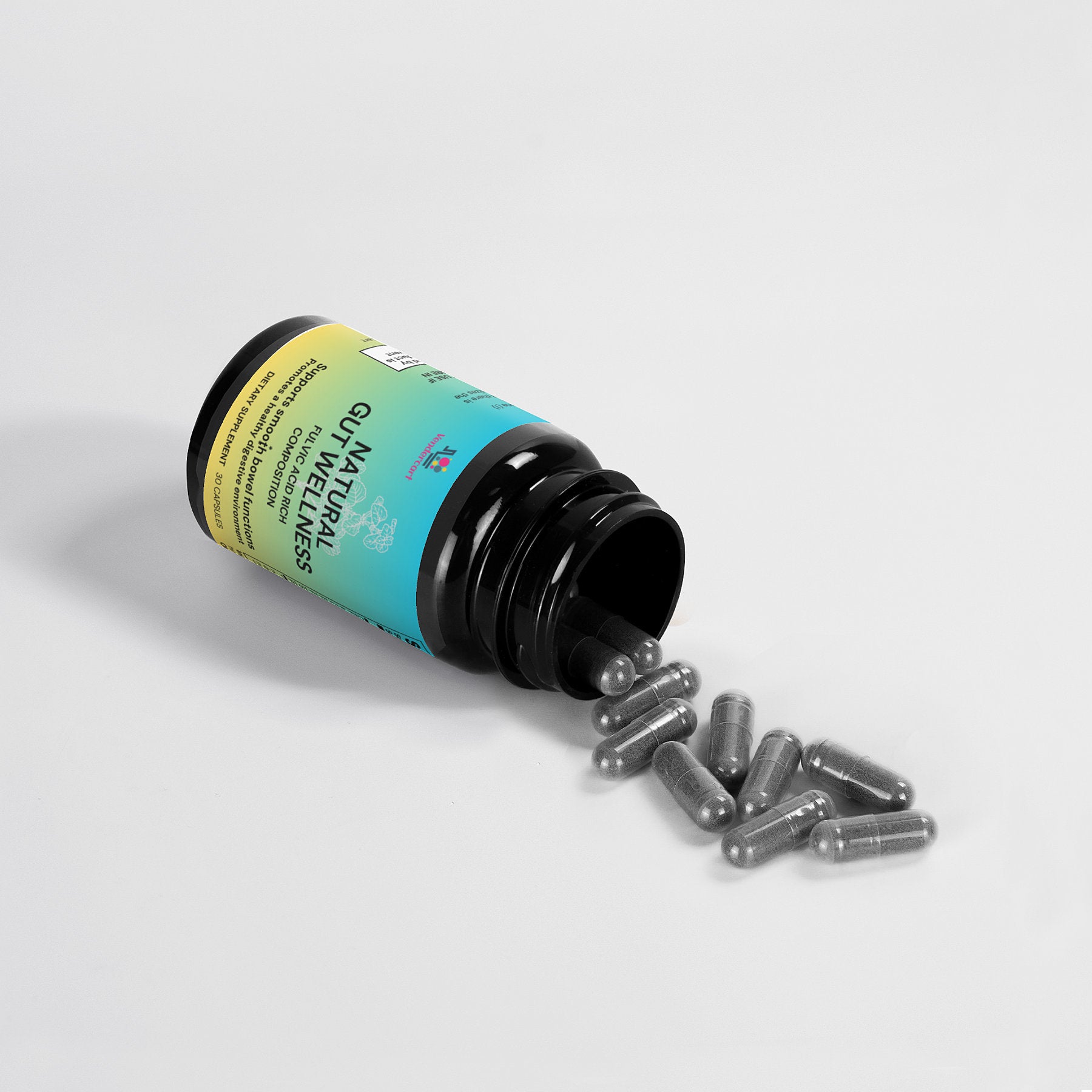 Hand holding Gut Wellness Capsules for digestive health