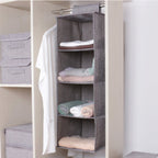 Beige Hanging Closet Storage Bag Hanging on Rod