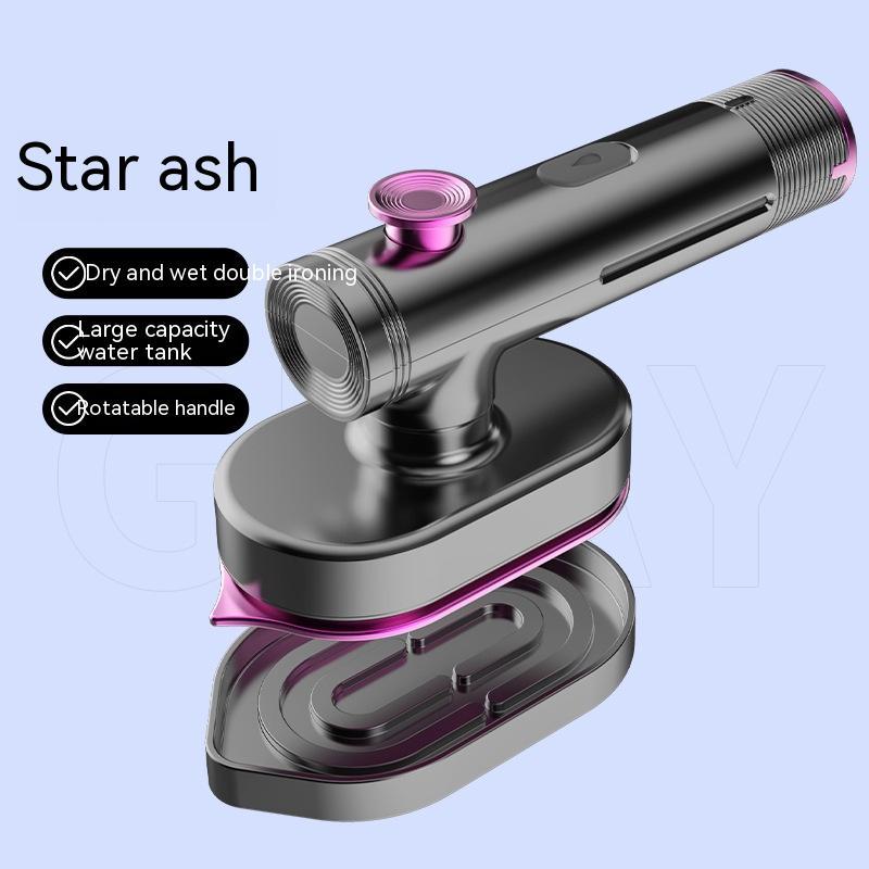 User holding Handheld Garment Steamer on fabric