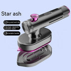 User holding Handheld Garment Steamer on fabric